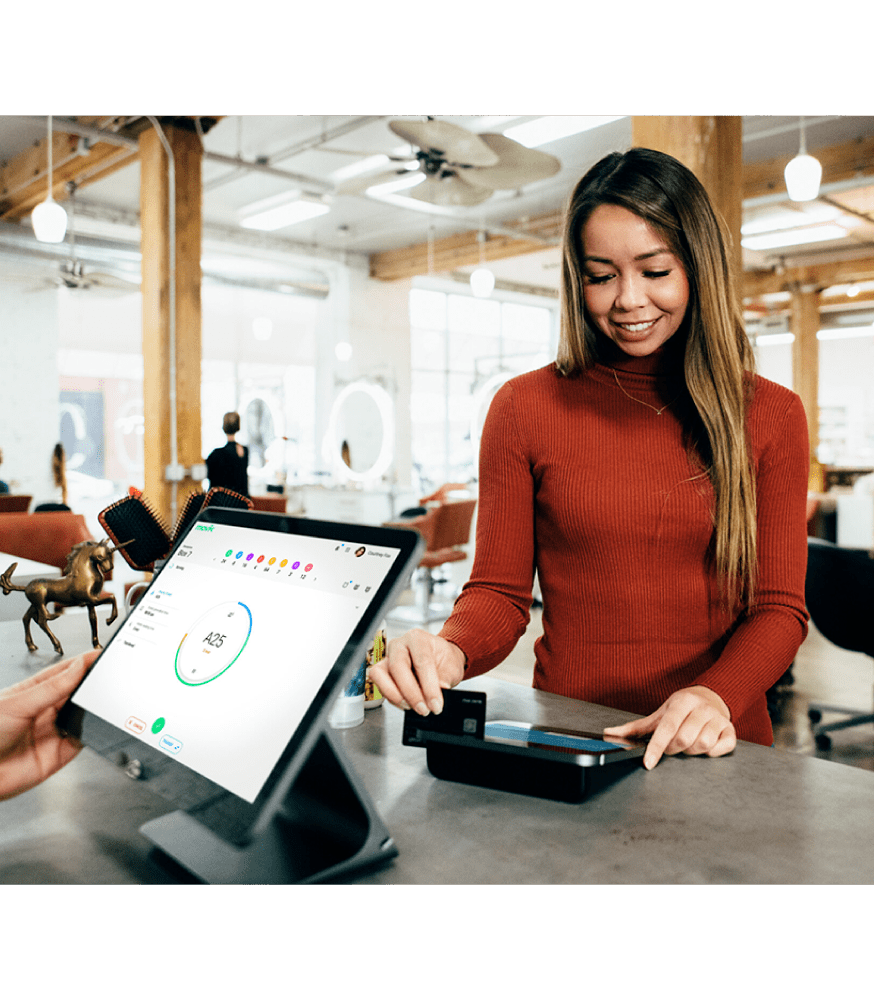 Customer served quickly thanks to an efficient queue management system in retail.