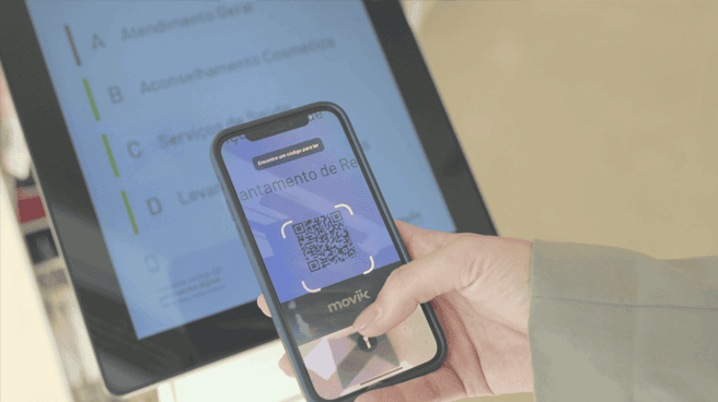 Smartphone showing digital ticket QR code  for queue management in retail